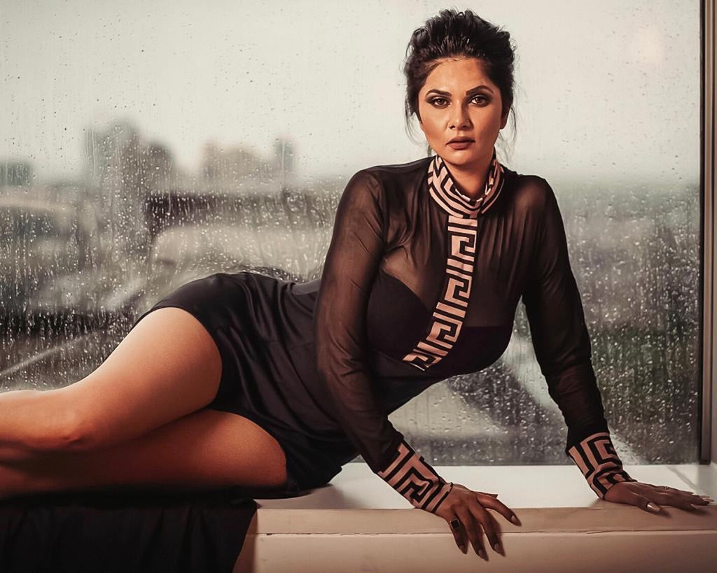 Midnight Elegance Sheer Black Gown