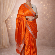 VASTRAYAM Bright Orange Mashru Katan Silk Banarasi Saree